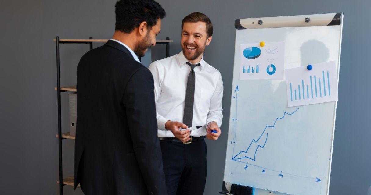 Business person looking at finance graphs